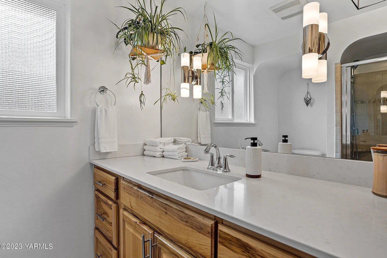 South 31st Avenue bathroom with updated vanity and mirror